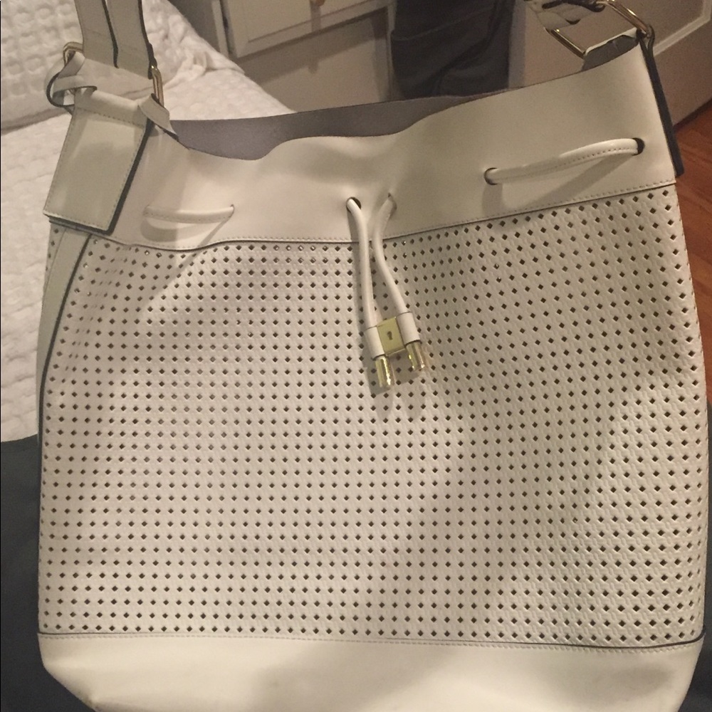 Large white leather hobo bag. Perforated leather